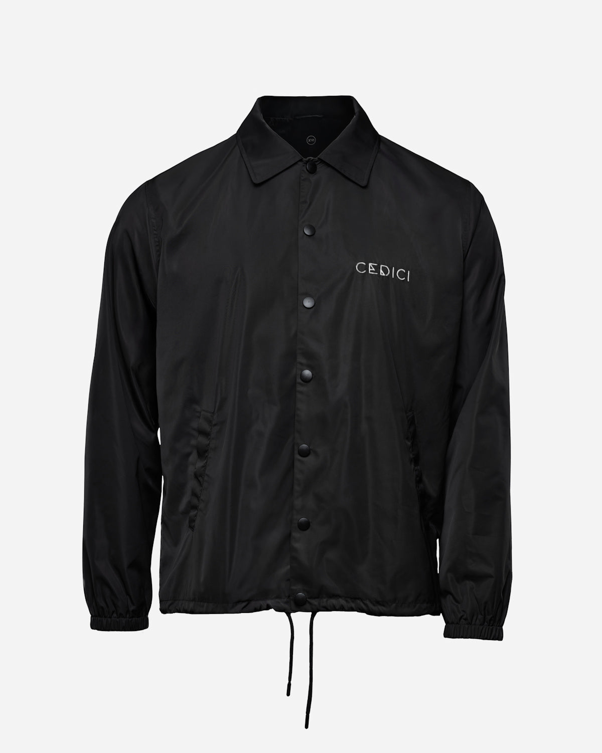 Black coach jacket with snap buttons and white CEDICI logo on left chest